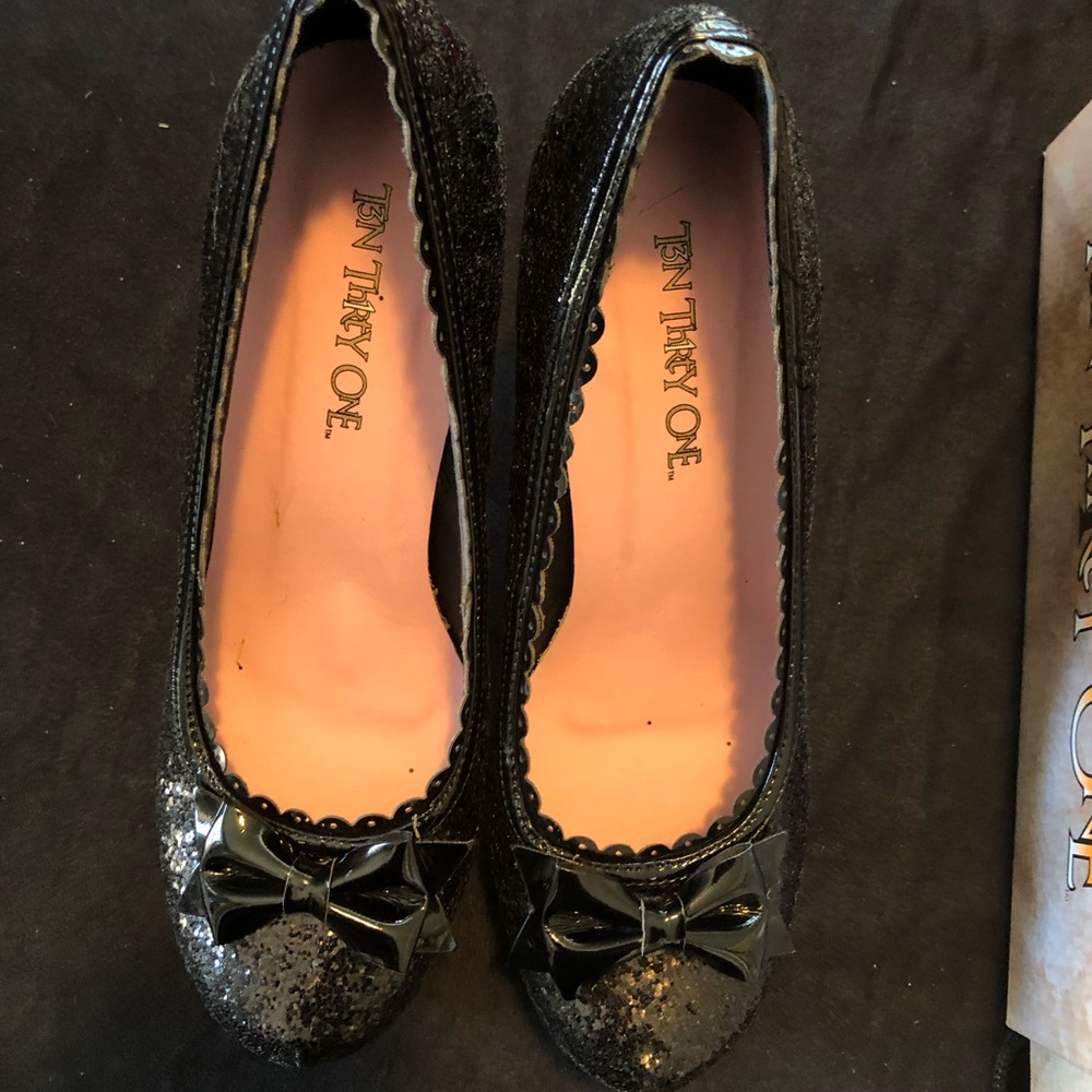 Ten Thirty-One black glitter heels.